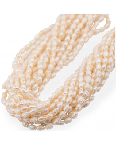 Perle Di Fiume Microperle Chicco Di Riso 4-4,5x5-7mm Bianco-REISKÖRNERPERLEN | Worldofjewel.com