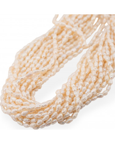 Perle Di Fiume Microperle Chicco Di Riso 4-4,5x5-7mm Pepita Bianco-REISKÖRNERPERLEN | Worldofjewel.com