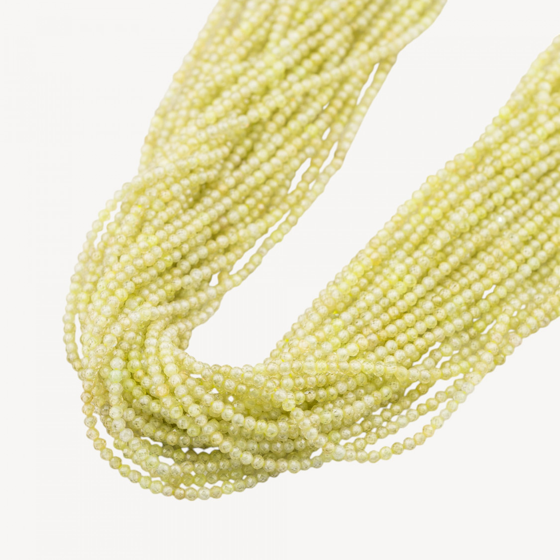 Zirconi Perline Sfaccettate 2mm Verde Peridot Chiaro-ZIRCONI | Worldofjewel.com