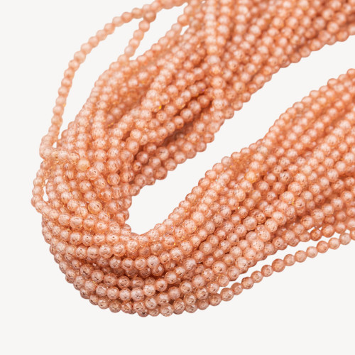 Cuentas de circonita facetada color champán de 3 mm