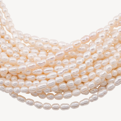 Perlas de río Microperlas de grano de arroz AA+ 4-5 mm Blanco