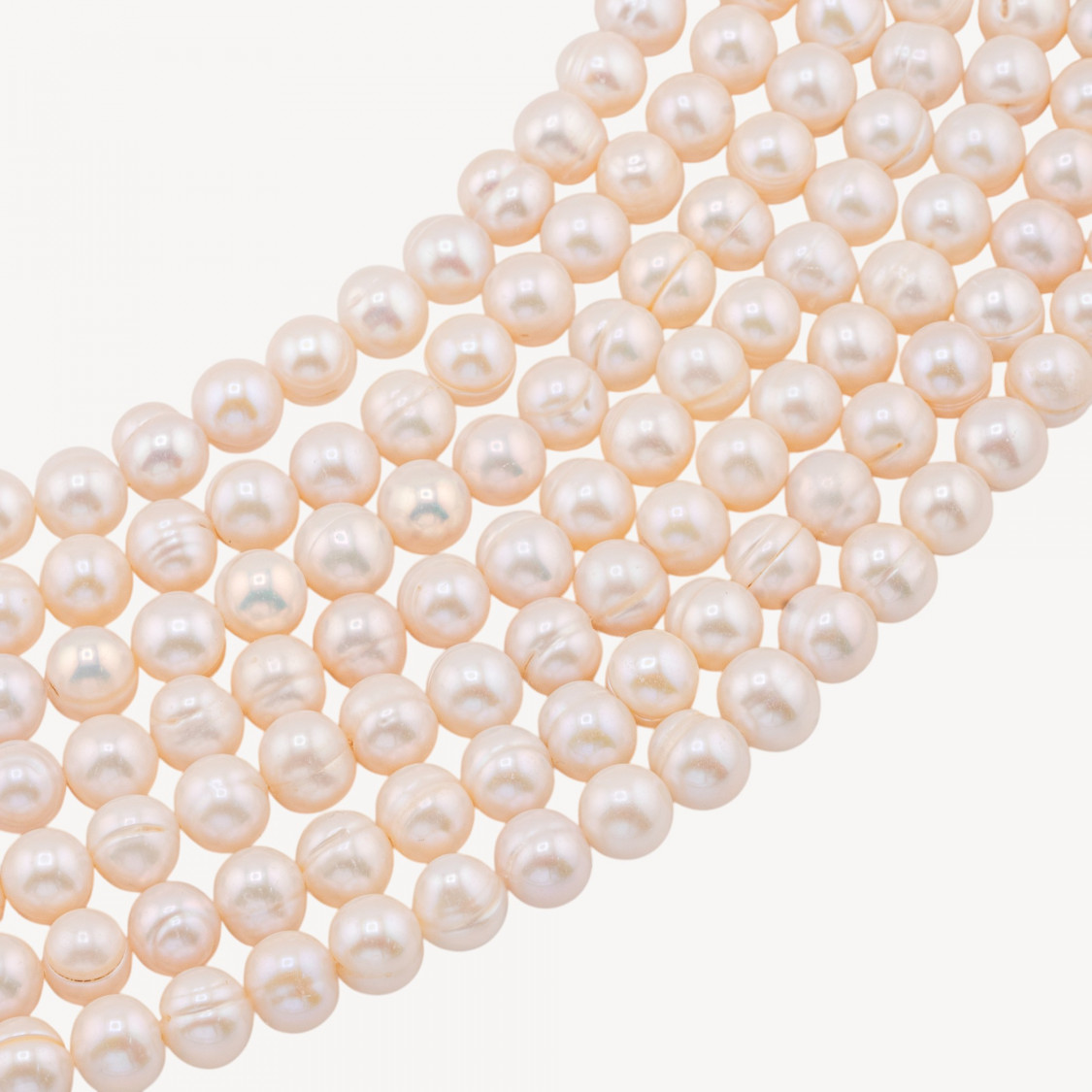 Perle di Fiume Semiround AA+ 8,5-9mm-CEBOLLAS REDONDAS DE PERLAS DE RÍO | Worldofjewel.com