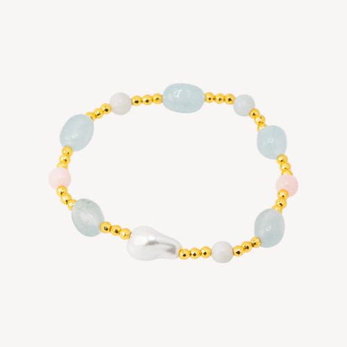 Bracelet élastique orné de pierres roulées, de perles de Majorque, d'hématite dorée et de jade béryl.