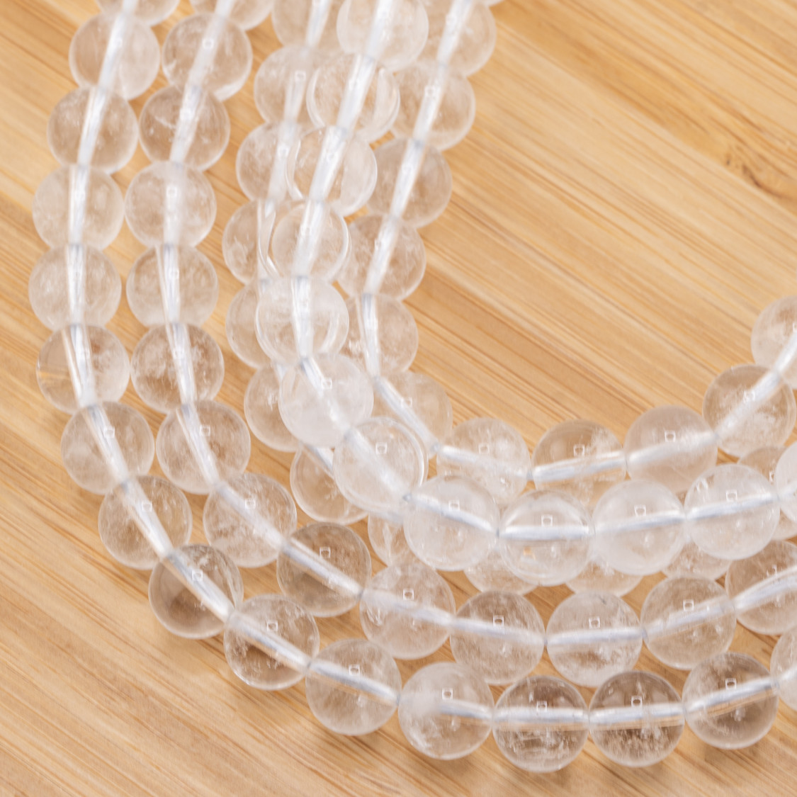 Cristal de roche nuage rond et lisse de 10 mm-CRISTAL DE ROCHE | Worldofjewel.com