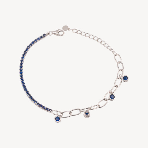Tennisarmband aus 925er Sterlingsilber mit Zirkonia und Verlängerungskette sowie rhodiniertem, saphirblauem Anhänger
