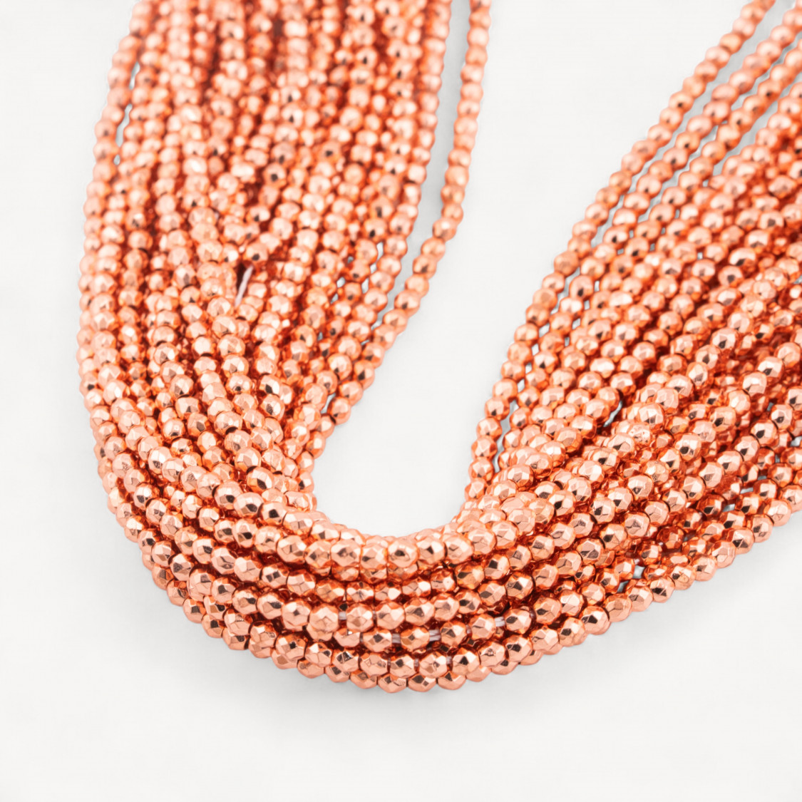 Cuenta redonda facetada de hematita de oro rosa de 2 mm-HEMATITES | Worldofjewel.com