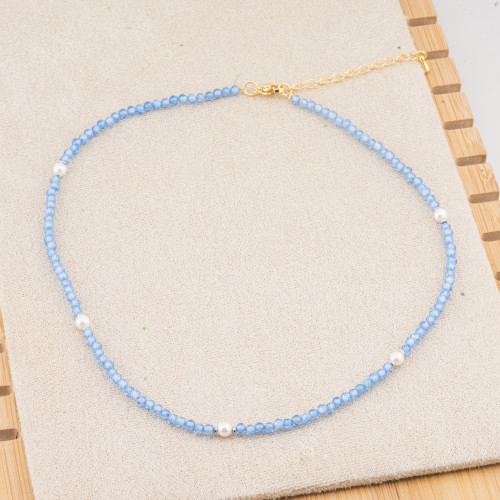 Collier de 10 pièces orné de cristaux bleus et de perles de Majorque, avec fermoir et chaîne en acier plaqué or.