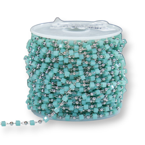 Chapelet en laiton rhodié vert turquoise avec cristaux cubiques de 2 mm et tige de 1 mètre