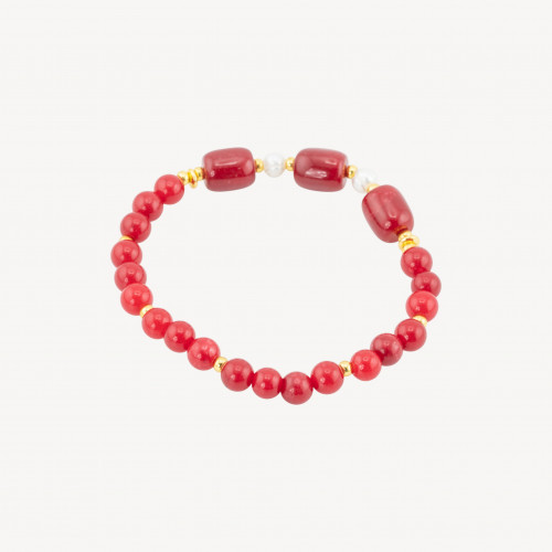 Bracelet élastique orné de pierres semi-précieuses, de perles de rivière, d'hématite dorée et de jade rouge.