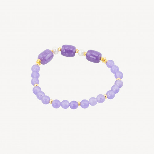 Bracelet élastique orné de pierres semi-précieuses, de perles de rivière, d'hématite dorée et de jade violet.